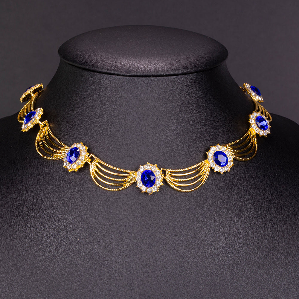 Arany tónusú Emporia Ötvözetű Szett Kék Emporia® Kristállyal és Fehér Emporia® Kristállyal ( Nyaklánc+Fülbevaló )