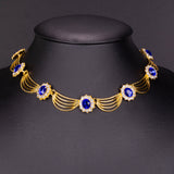 Arany tónusú Emporia Ötvözetű Szett Kék Emporia® Kristállyal és Fehér Emporia® Kristállyal ( Nyaklánc+Fülbevaló )