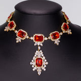 Arany tónusú Emporia Ötvözetű Szett Vörös Emporia® Kristállyal és Fehér Emporia® Kristállyal ( Nyaklánc+Fülbevaló )