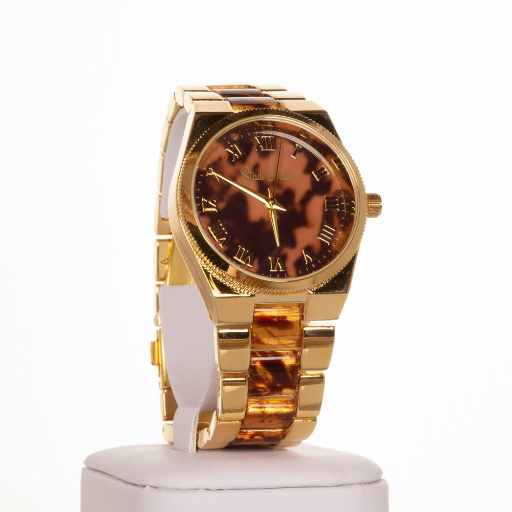 Arany színű női óra tigris csíkokkal és római számos számlappal - Multilady.hu