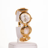 AW arany színű női óra végtelen szimbólomú szíjjal és 4 kvrackristállyal - Multilady.hu